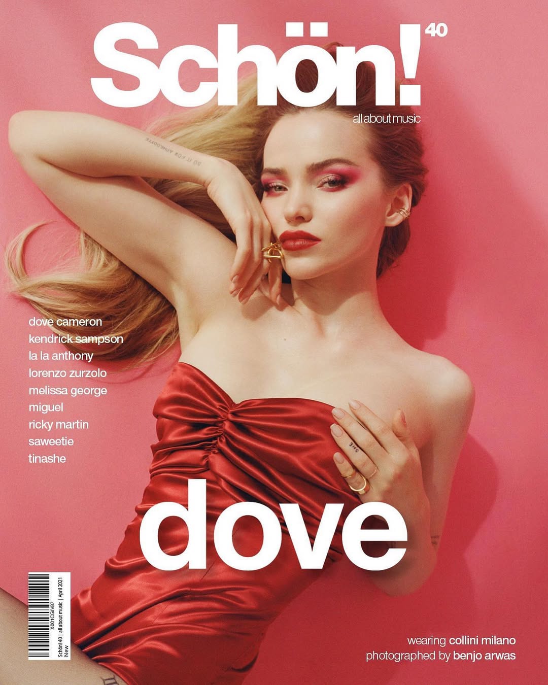 Schön! magazine cover featuring Dove Cameron in a red dress, lying down against a pink background with editorial makeup and jewelry.
