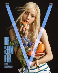 Blonde woman with long hair holding a piece of fruit and a bouquet of wildflowers against a dark background