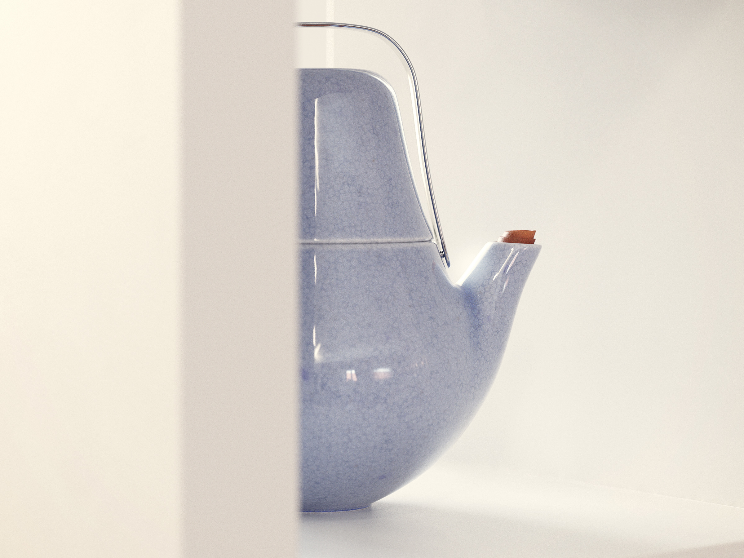Minimalist blue ceramic teapot with metal handle sits on a white surface against a bright white background in a close-up studio shot.