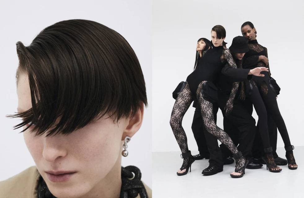 Fashion editorial shot of five women with dark hair in black outfits posing against a white backdrop in a studio setting.