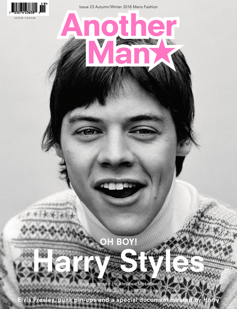 Black-and-white magazine cover featuring a close-up of Harry Styles with a wide, open-mouthed smile and a patterned sweater.