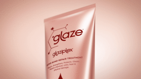 Close-up 3D render of a glossy pale pink Glaze hair treatment tube on a soft monochromatic background
