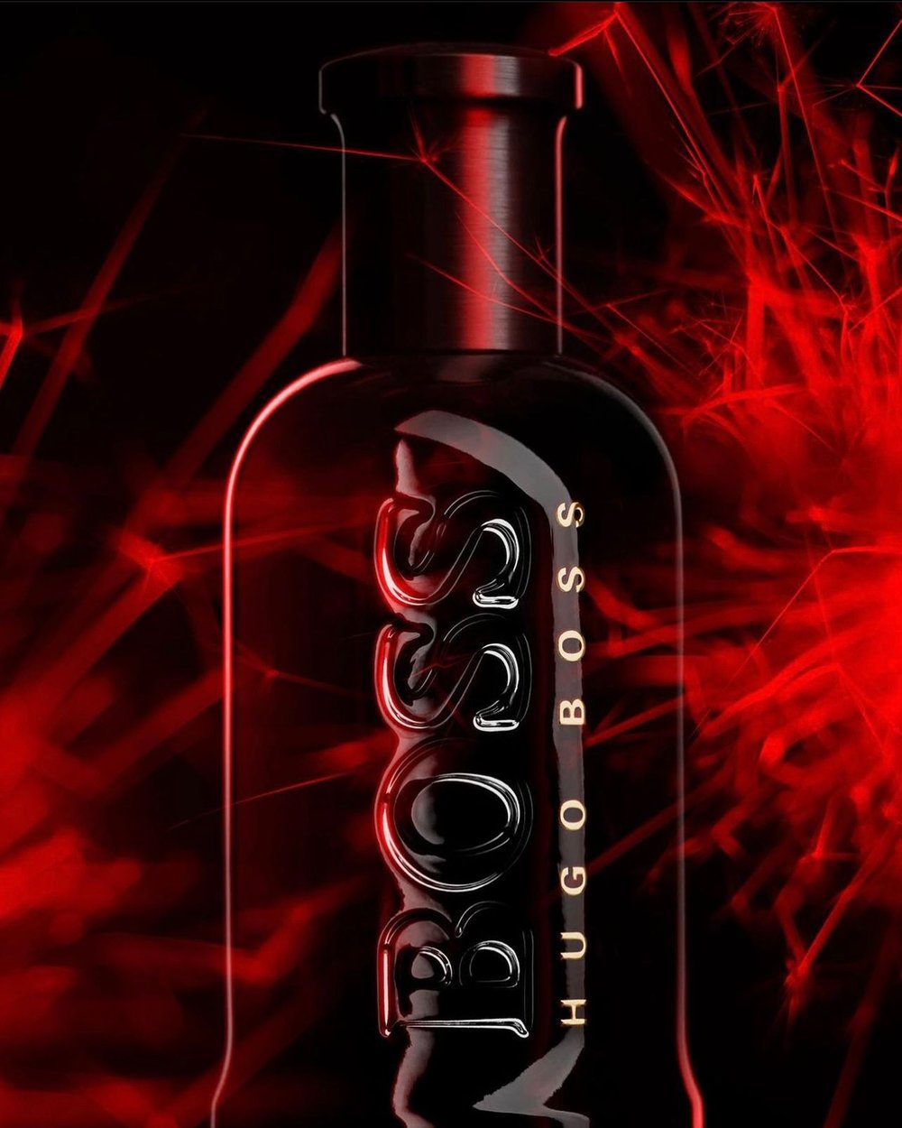 Hugo Boss dark perfume bottle against a black background with red light effects, showcasing a stylish and modern aesthetic.