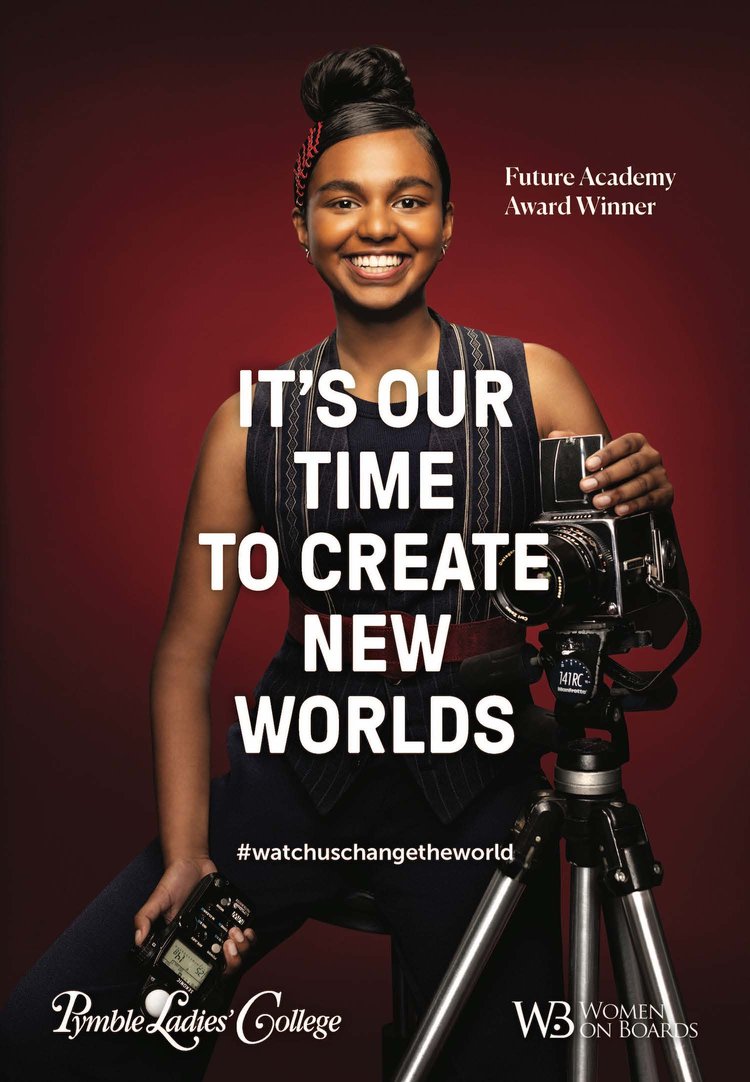 Young woman photographer holding a light meter and vintage camera on a tripod against a red background with motivational text overlay.