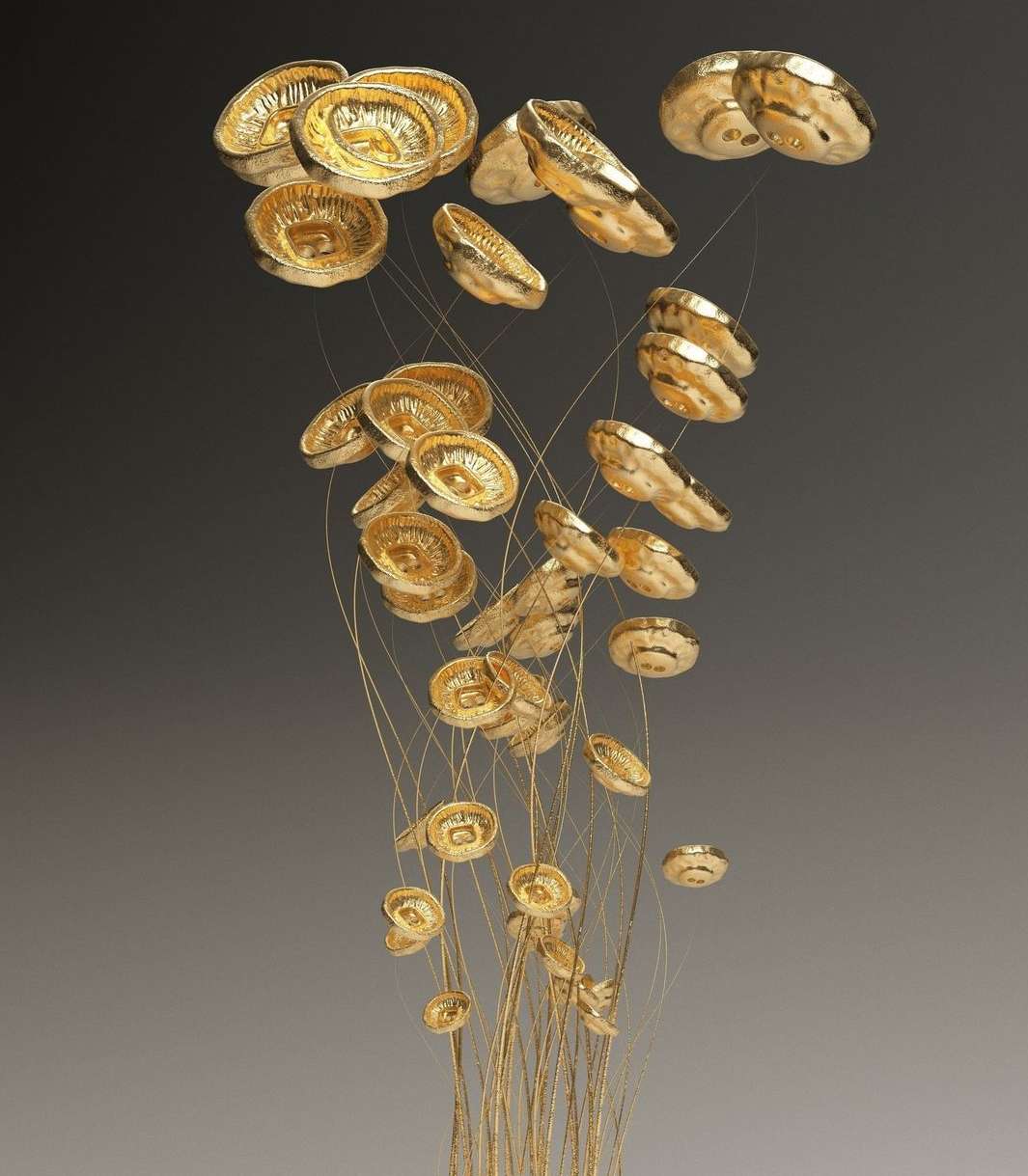 Artistic composition featuring golden, circular ornaments suspended by delicate, thin strands against a gradient grey background.
