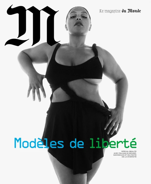 Magazine cover featuring a woman with an expressive pose wearing a black swimsuit. The composition includes magazine text and logos.