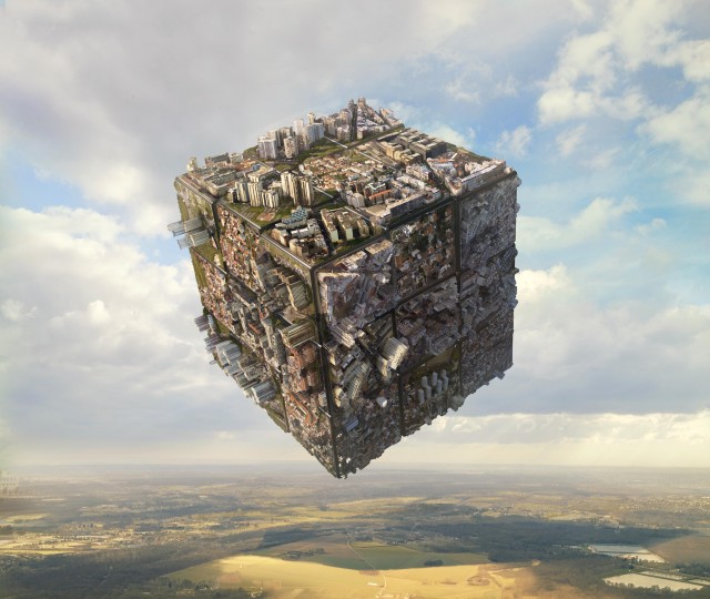 Cityscape composed into a cube-shaped building floats in the sky above a rural landscape on a sunny day with scattered clouds.