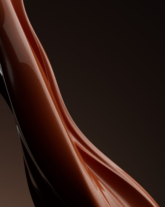 Abstract close-up of flowing caramel or toffee reveals smooth texture and warm brown tones against a dark background, enhancing food appeal.