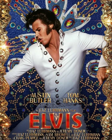 Movie poster for Elvis features Austin Butler in a white jumpsuit against a blue jeweled background with a gold ornate border.