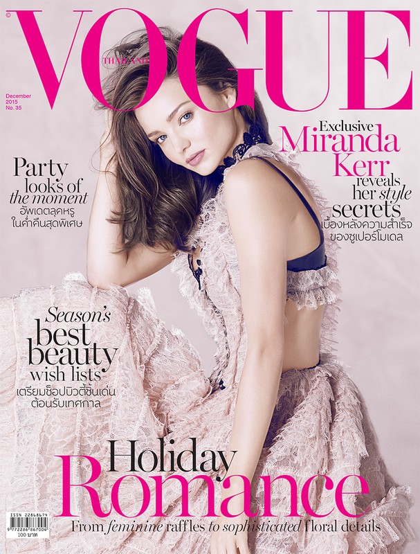Magazine cover featuring Miranda Kerr wearing a lacy pink dress. The cover promotes stories on holiday romance, beauty wish lists, and style secrets.
