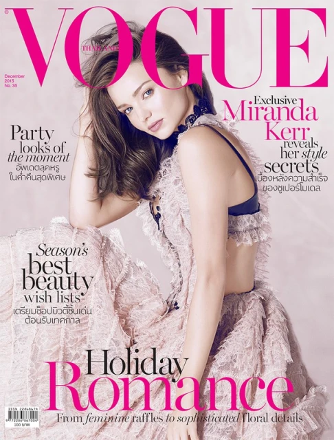 Magazine cover featuring Miranda Kerr wearing a lacy pink dress. The cover promotes stories on holiday romance, beauty wish lists, and style secrets.