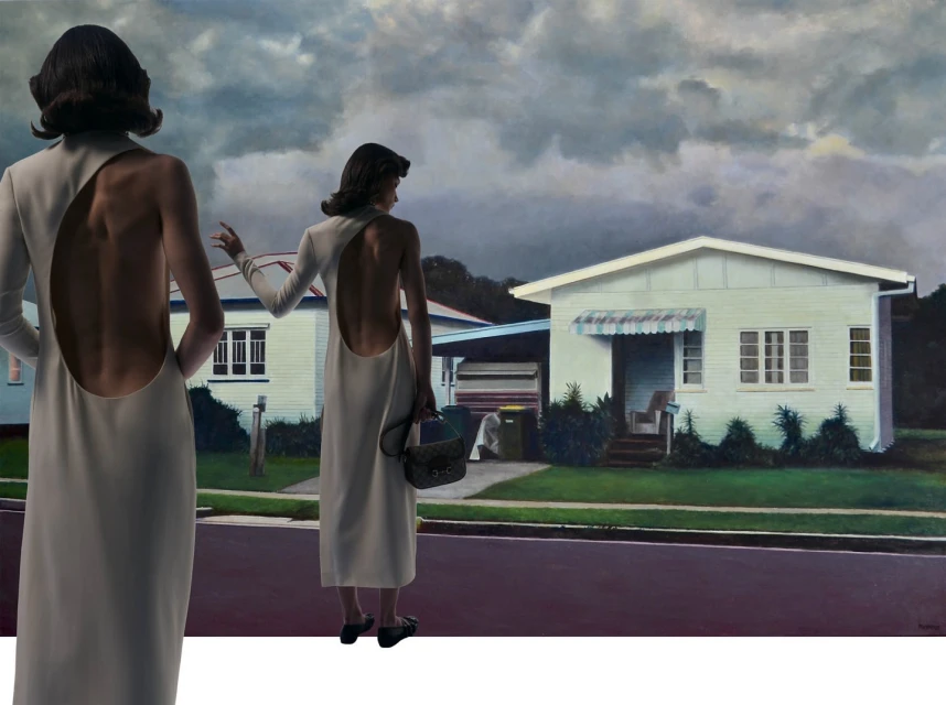 Two women in white dresses stand before a house on a cloudy day. The dresses feature open-back designs and a touch of elegance.