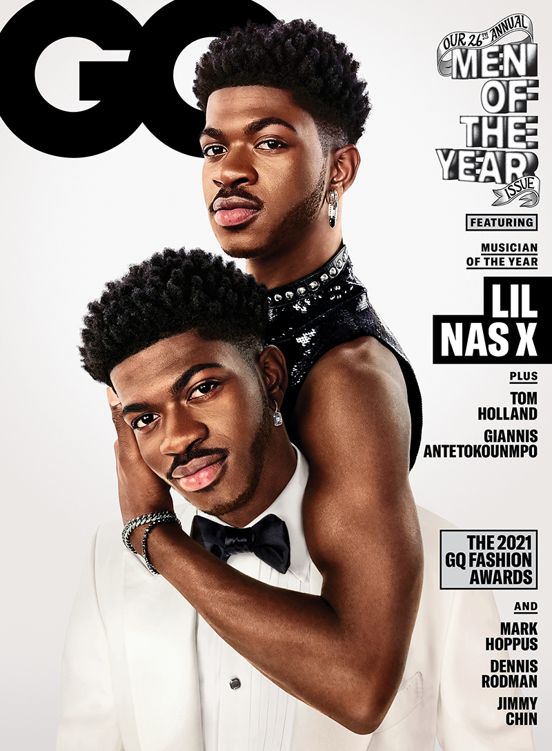 GQ magazine cover featuring Lil Nas X on a white background with black text and fashion awards. Two people shown in formalwear.