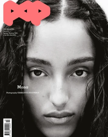 Black-and-white fashion magazine cover featuring a close-up of a woman's face with dark hair, a POP magazine logo, and model's name.