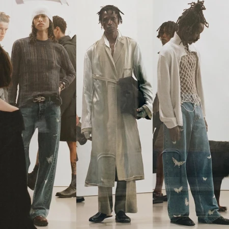 Runway fashion shot featuring three models in streetwear-inspired outfits, showcasing denim jeans and neutral-tone layering against a clean backdrop.