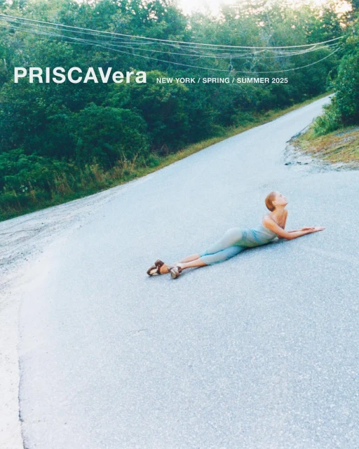 Fashion editorial featuring a model lying on a road surrounded by trees, showcasing apparel from Priscavera's New York Spring/Summer 2025 collection.