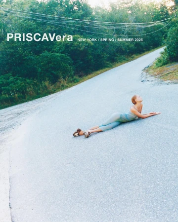 Fashion editorial featuring a model lying on a road surrounded by trees, showcasing apparel from Priscavera's New York Spring/Summer 2025 collection.