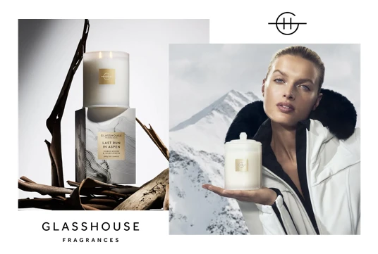 Glasshouse Fragrances product shot featuring a candle on a marble box next to a portrait of a model holding a candle. 