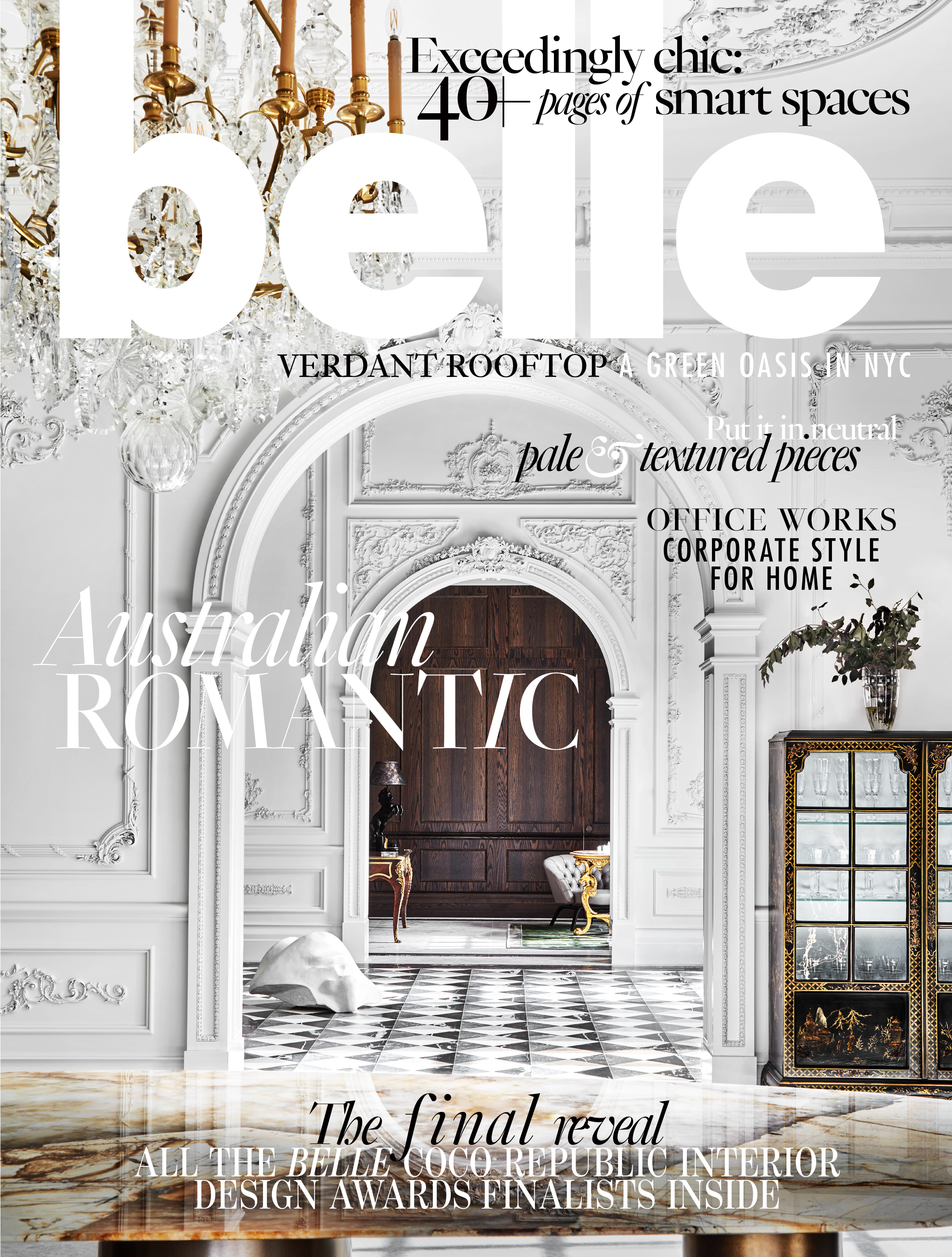 Belle magazine cover featuring an interior design awards issue with a detailed architectural backdrop, chandelier, and muted color palette.