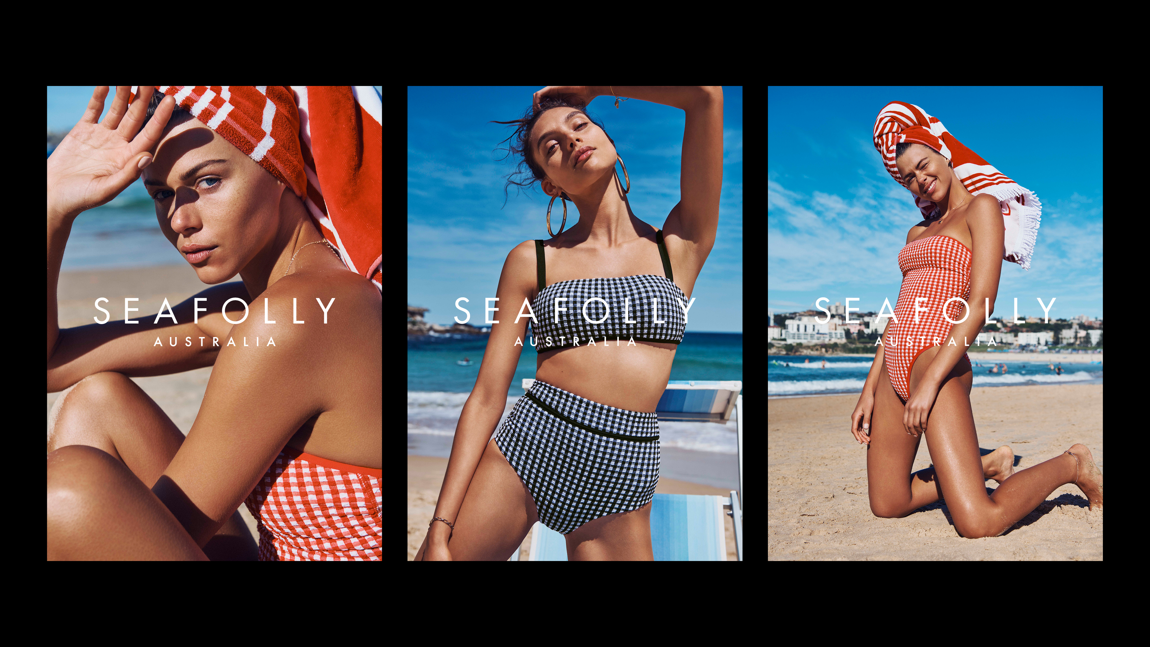 Three panels show swimsuit models by the beach, wearing checkered swimwear and towels, under bright blue sky. Seafolly Australia logo.