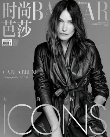 Black-and-white Harper's Bazaar magazine cover featuring Carla Bruni, wearing a leather trench coat and posing against a gray backdrop.