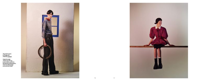 Fashion editorial shot of a male model in Prada and Camper, holding a lasso; and a female model in a red dress sitting on a beam.