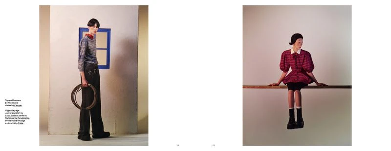 Fashion editorial shot of a male model in Prada and Camper, holding a lasso; and a female model in a red dress sitting on a beam.