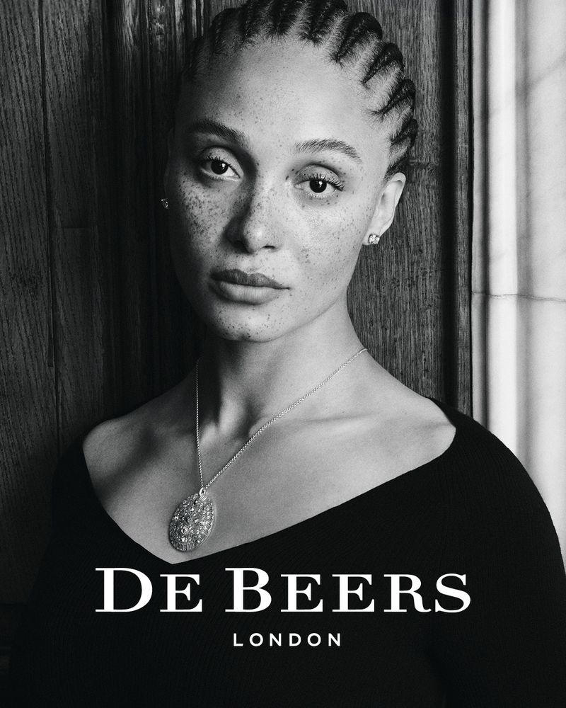 Portrait of model Adwoa Aboah wearing a diamond pendant necklace for De Beers shot in black and white