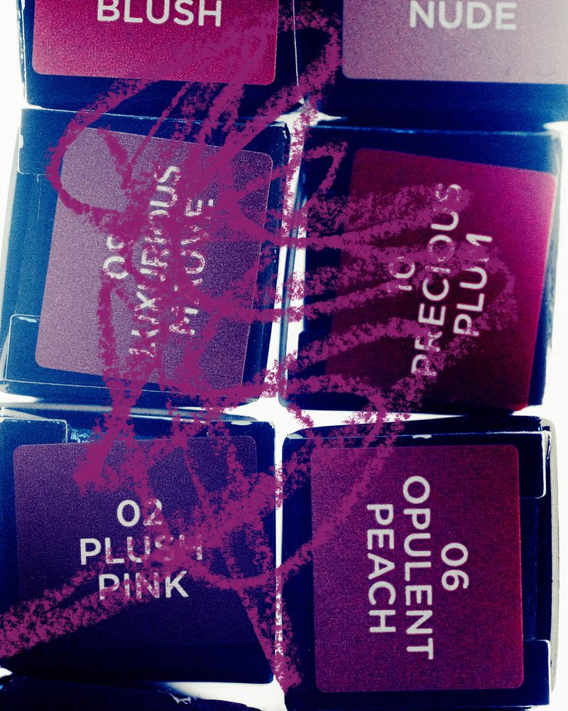 Several containers of cosmetics are stacked; each container shows the cosmetic name and color, such as Plush Pink and Opulent Peach.