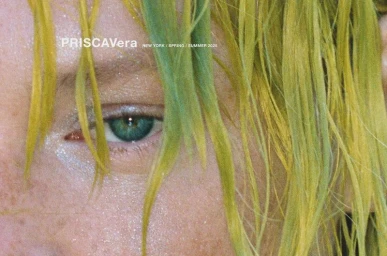 Extreme close-up shot of a model's eye with green-tinted wet hair falling across the frame and visible brand text PRISCAVera.