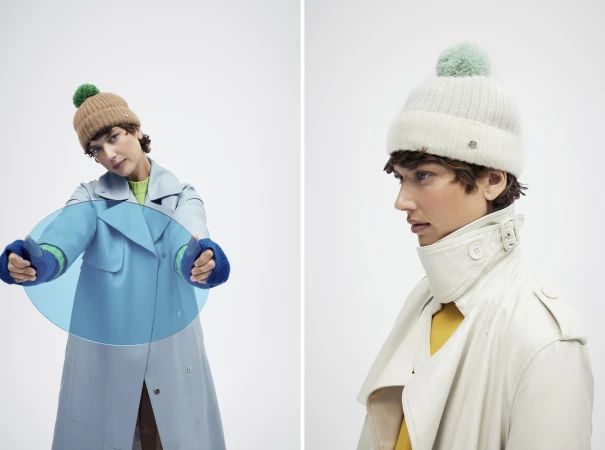 Two-panel fashion shot of a young adult woman modeling winter hats and trench coats in a photo studio with a bright, even lighting.