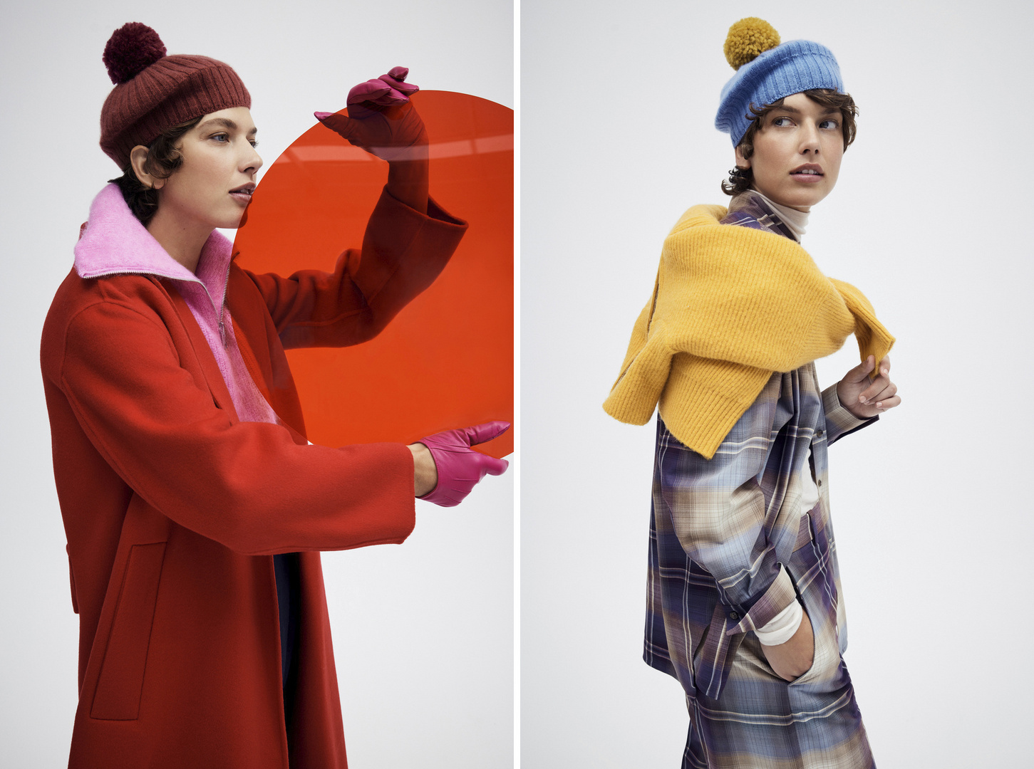 Two fashion models showcase autumn knitwear and outerwear in a studio setting with bright, solid-colored accents and a modern aesthetic.