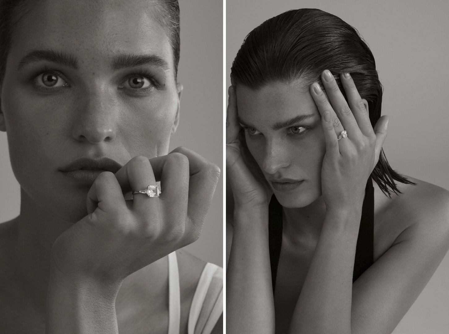 Monochrome portrait of a woman showcasing an engagement ring, eyes gazing to the side, in a minimalist studio setting with soft lighting.