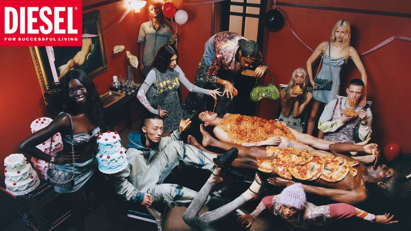Editorial fashion shot featuring a diverse group of adults indoors with food like cakes, spaghetti, and pizza in a red-walled setting.