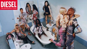 Group of models posing in a pastel blue bathroom setting for the Diesel spring summer 2025 fashion campaign