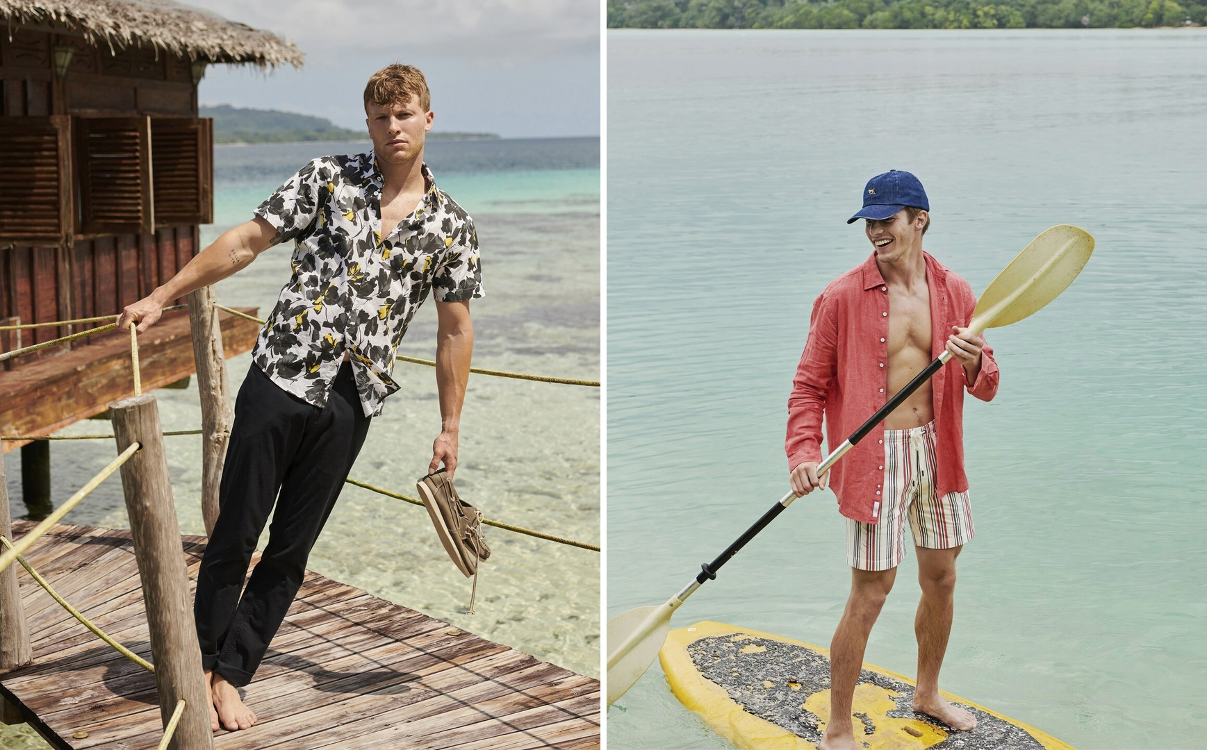 Two men model summer outfits by the ocean; one stands by a hut in a black and white floral shirt, the other on a surfboard.