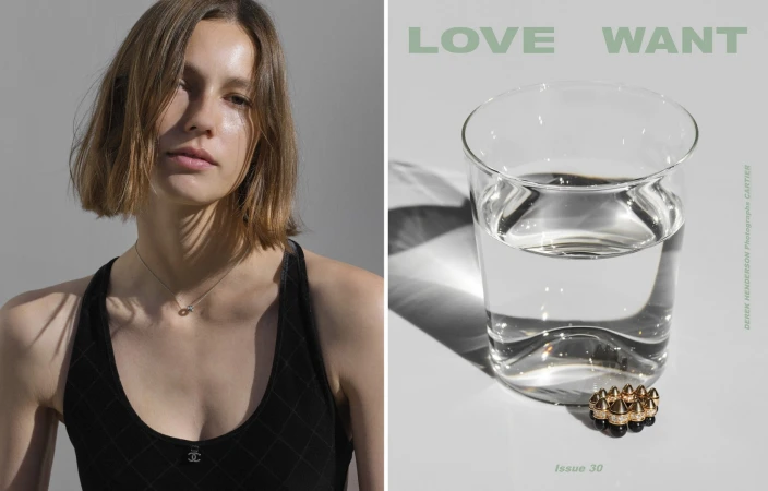 Close-up portrait of a woman wearing a black tank top and necklace, next to a glass of water and a gold ring on a white surface.