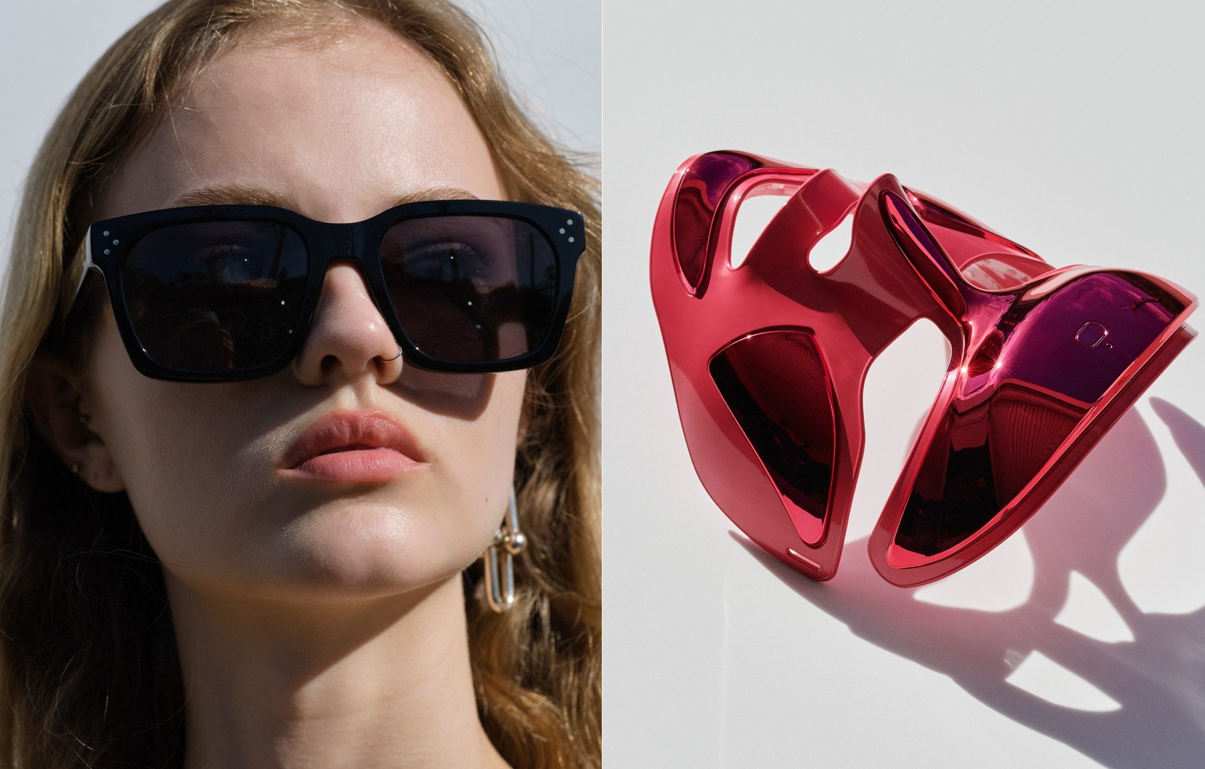 Close-up portrait of a woman wearing dark sunglasses beside a glossy metallic red sculptural eyewear piece against a plain white background.