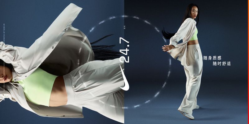 Athleisure fashion shot with Asian female model in motion wearing a beige sports suit with a lime-green sports bra against a blue background.