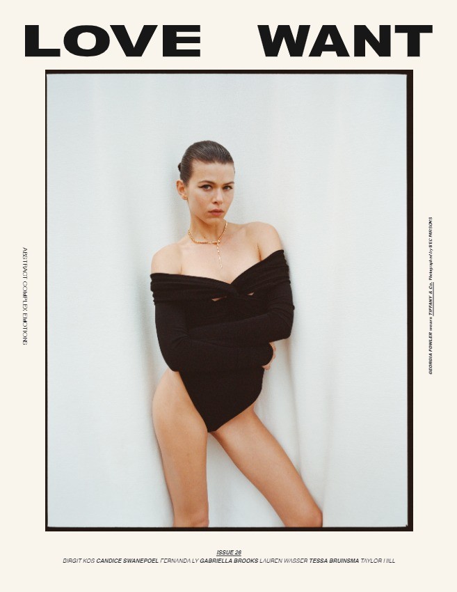 Georgia Fowler wearing a black off-the-shoulder bodysuit against a plain white studio background for Love Want magazine.
