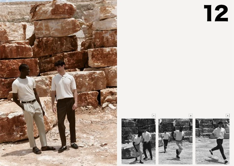 Two men pose in neutral-toned casual wear against a background of stacked rock formations under natural light, with a modern fashion editorial aesthetic.