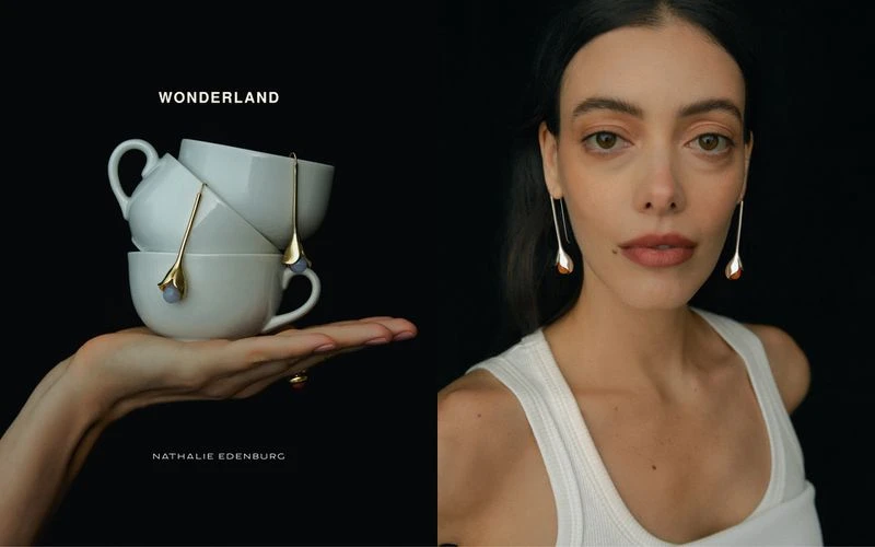 Close-up: fair-skinned woman in white tank top with gold earrings, complemented by a hand holding white tea cups and gold jewelry.