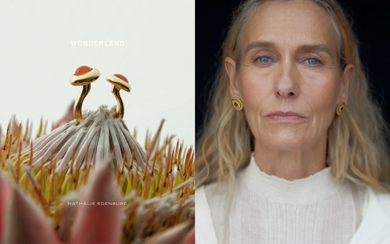Close-up shot of a pair of mushroom-shaped gold earrings atop a protea flower and a portrait of an adult woman with blond hair.