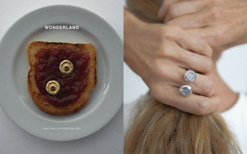 Toast with jam and jewelry on a plate next to a woman holding her hair up, focusing on her jewelry, set against a neutral backdrop.
