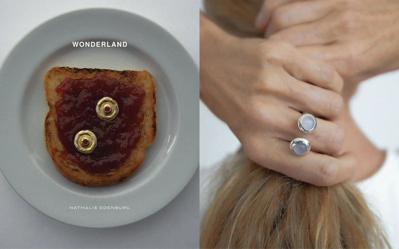 Toast with jam and jewelry on a plate next to a woman holding her hair up, focusing on her jewelry, set against a neutral backdrop.