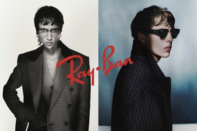 Ray-Ban ad featuring a young adult woman in glasses and a patterned blazer, and a young adult man in sunglasses and a striped coat.