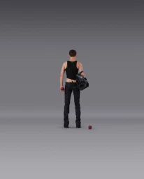 Model seen from behind wearing black top and trousers against a grey studio backdrop, holding a red apple.
