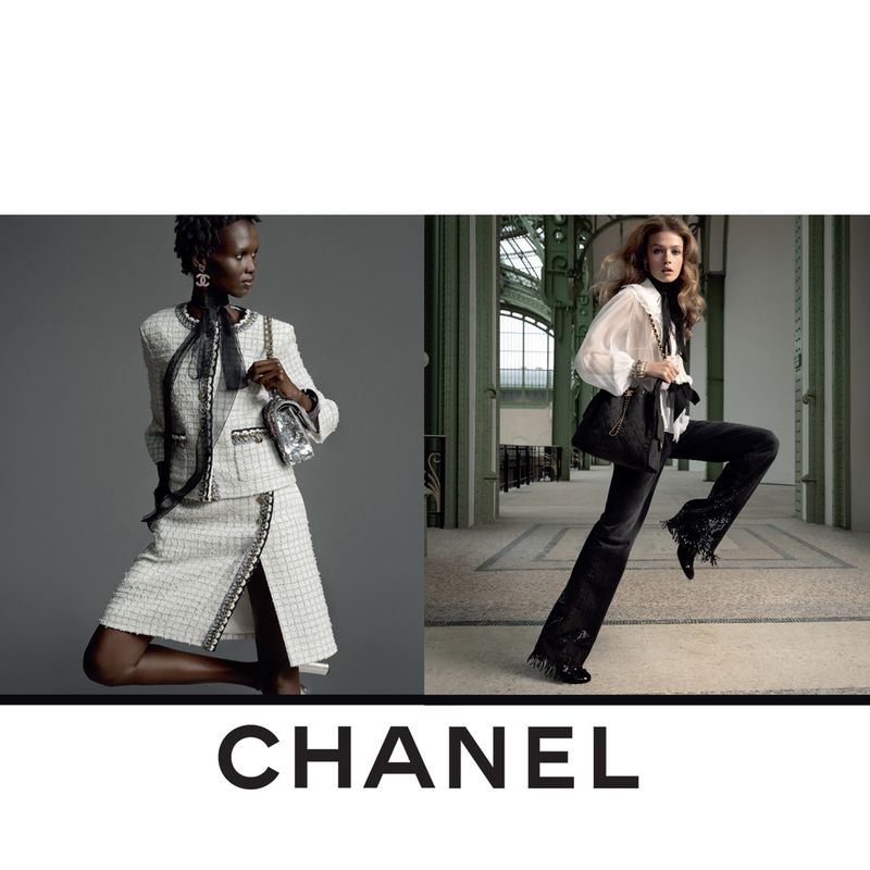 Fashion editorial featuring two women modeling Chanel apparel and accessories in an indoor environment with grey and architectural backgrounds.