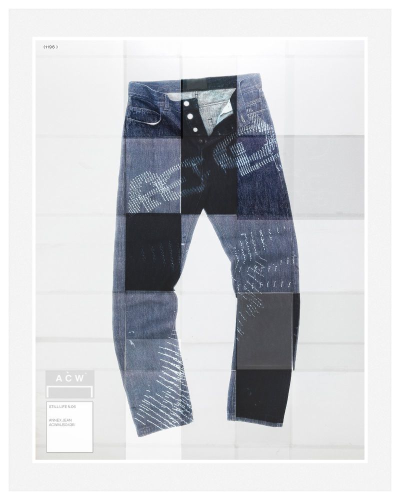 Image of denim jeans on a white backdrop, featuring patchwork and graphic patterns, presented in a studio setting, fashion-forward.