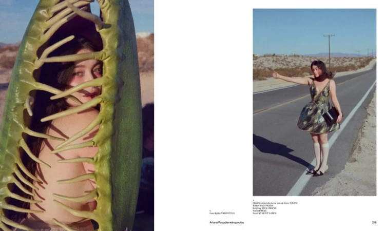 Fashion editorial shot featuring a woman in a dress on a desert road and another woman peeking out from a giant green plant pod.